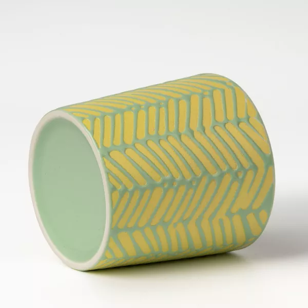 Ceramiczne świeczniki z geometrycznym reliefem